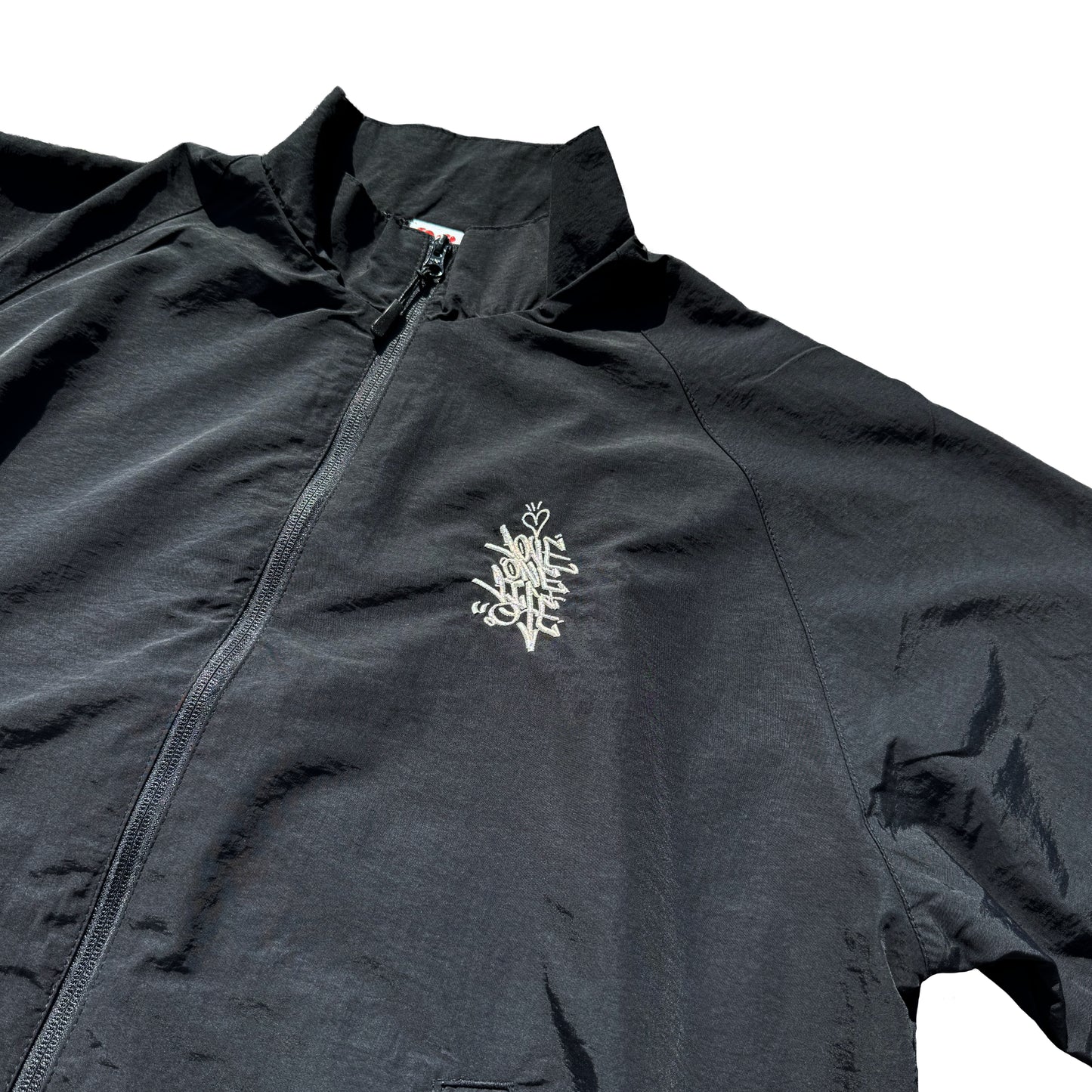 love one life training jacket in black