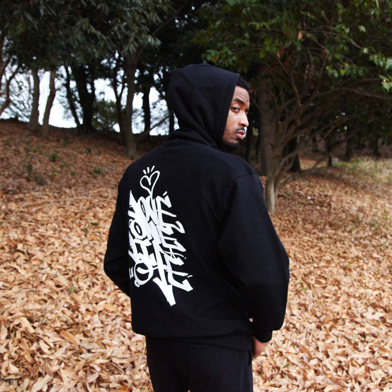 tagging reverse weave hoodie in black